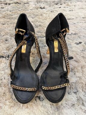 BCBGMaxAzria Black Ankle-Strap Heels with Gold Chain